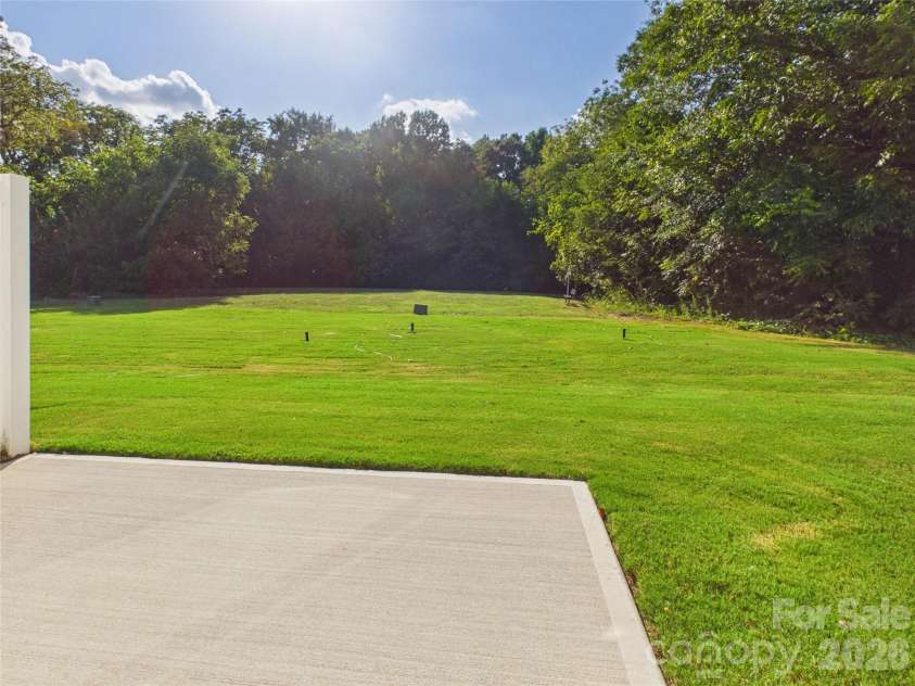 105 Dilling Street, Kings Mountain, NC 28086.  MLS# CAR4429521, YatesRealty ID 42201. 12x12 patio with privacy fence between units.  yard opens to the Common Open Space