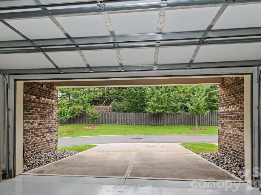 2505 Kenmore Avenue, Charlotte, NC 28204.  MLS# CAR4411346, YatesRealty ID 42206. This property features an expanded parking pad/driveway with additional space for two extra vehicles.