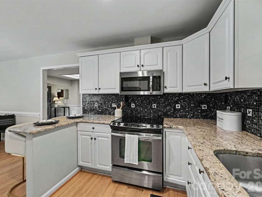 4242 Garvin Drive, Charlotte, NC 28269.  MLS# CAR4411479, YatesRealty ID 42208. 