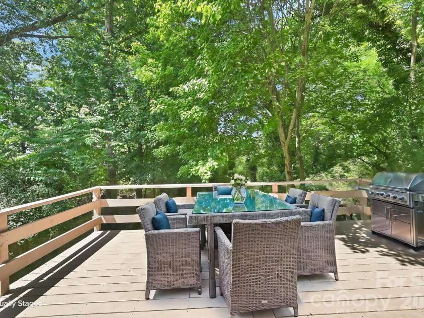 297 White Pine Drive, Asheville, NC 28805.  MLS# CAR4359261, YatesRealty ID 42218. Deck virtual staging