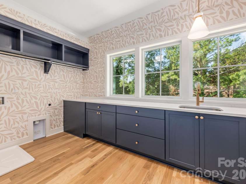 4409 Castleton Road, Charlotte, NC 28211.  MLS# CAR4394989, YatesRealty ID 42221. Upper laundry room