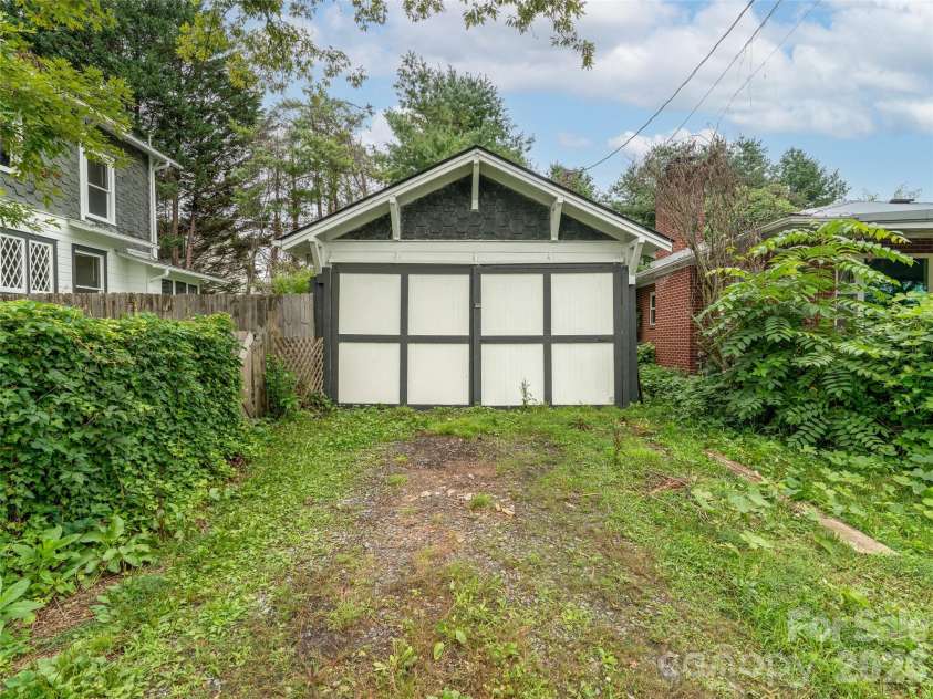 111-113 Stewart Street, Hendersonville, NC 28792.  MLS# CAR4410285, YatesRealty ID 42230. Garage Front/Driveway, Now Studio