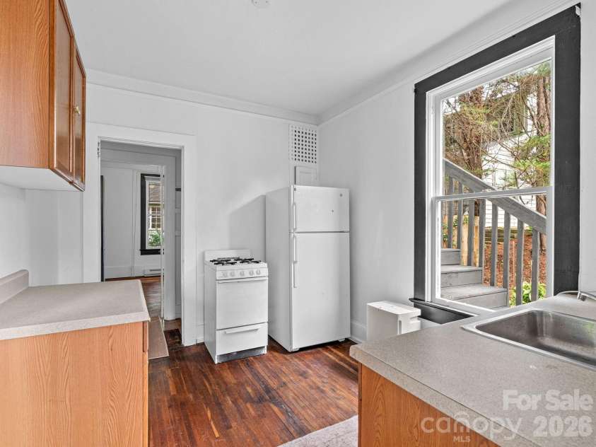 111-113 Stewart Street, Hendersonville, NC 28792.  MLS# CAR4410285, YatesRealty ID 42230. Lower Level Kitchen