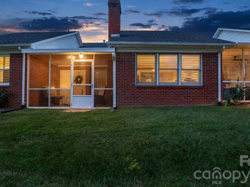 19940 Oak Leaf Circle, Cornelius, NC 28031.  MLS# CAR4410513, YatesRealty ID 42233. Looking back from the sidewalk around the pond