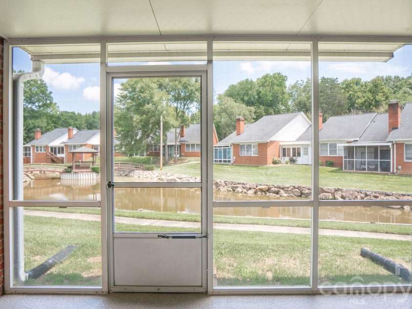 19940 Oak Leaf Circle, Cornelius, NC 28031.  MLS# CAR4410513, YatesRealty ID 42233. Perfect setting for morning coffee or an afternoon tea
