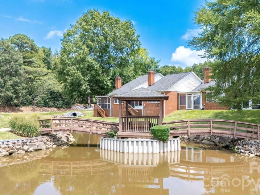 19940 Oak Leaf Circle, Cornelius, NC 28031.  MLS# CAR4410513, YatesRealty ID 42233. Relaxing view from the screened-in porch