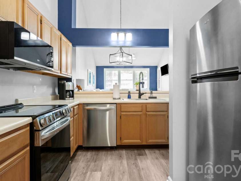 19940 Oak Leaf Circle, Cornelius, NC 28031.  MLS# CAR4410513, YatesRealty ID 42233. Updated kitchen with newly updated appliances (2024) all wifi accessible