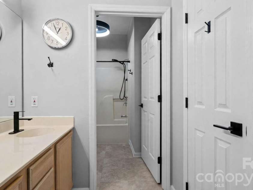 19940 Oak Leaf Circle, Cornelius, NC 28031.  MLS# CAR4410513, YatesRealty ID 42233. Updated shower head