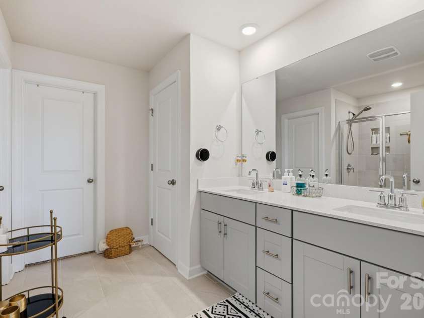 571 Palmarosa Street, Fort Mill, SC 29715.  MLS# CAR4402132, YatesRealty ID 42237. Master Bathroom