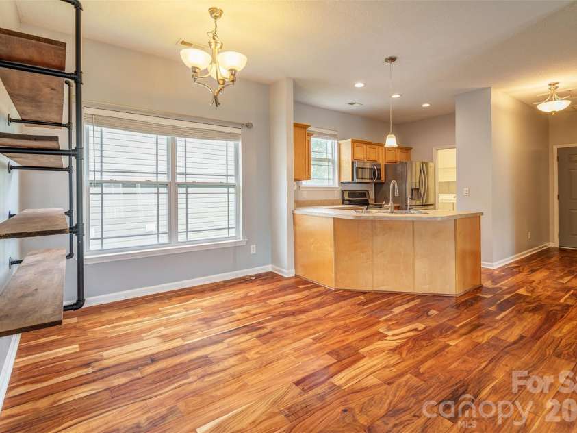 15 Mill Creek Loop, Asheville, NC 28806.  MLS# CAR4406752, YatesRealty ID 42245. Open kitchen, dining, and living creates the perfect space for gathering.