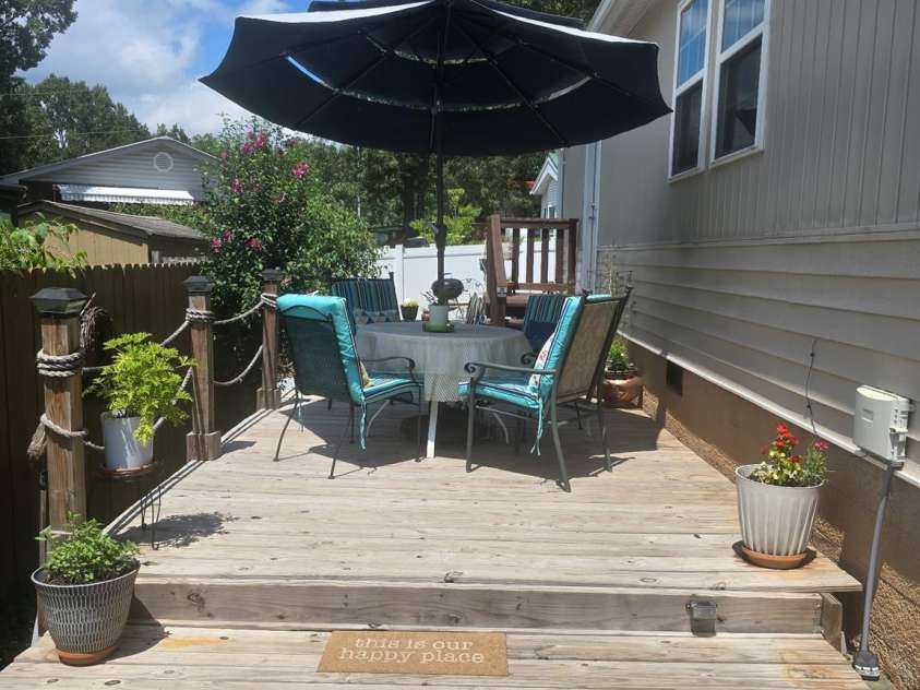 110 Twin Bluff Trail, Mount Gilead, NC 27306.  MLS# CAR4409542, YatesRealty ID 42258. HGrill pad behind deck