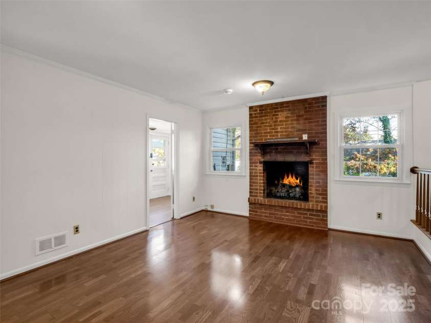 101 Bent Creek Ranch Road, Asheville, NC 28806.  MLS# CAR4318923, YatesRealty ID 4226. Den with gas fireplace