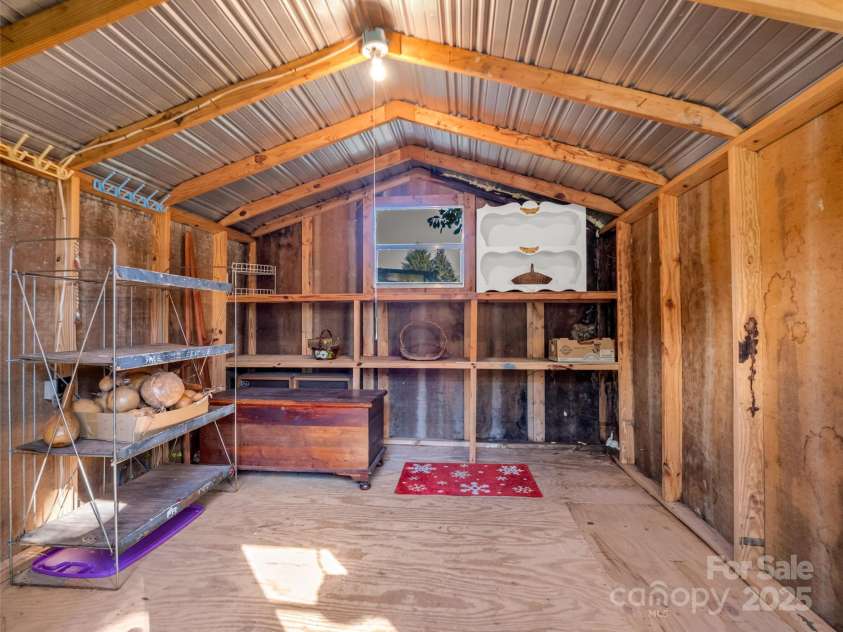101 Bent Creek Ranch Road, Asheville, NC 28806.  MLS# CAR4318923, YatesRealty ID 4226. Utility building with power and shelving-great for storage or a workshop