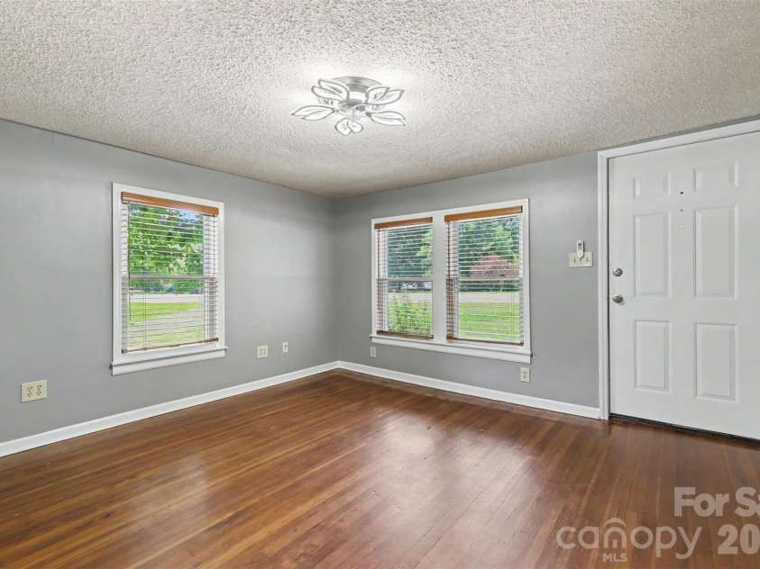 5196 Green Road, Stanley, NC 28164.  MLS# CAR4411421, YatesRealty ID 42267. Living Room