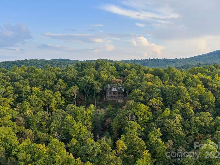 243 Ridgeline Drive, Brevard, NC 28712.  MLS# CAR4313542, YatesRealty ID 4227. Main House 
