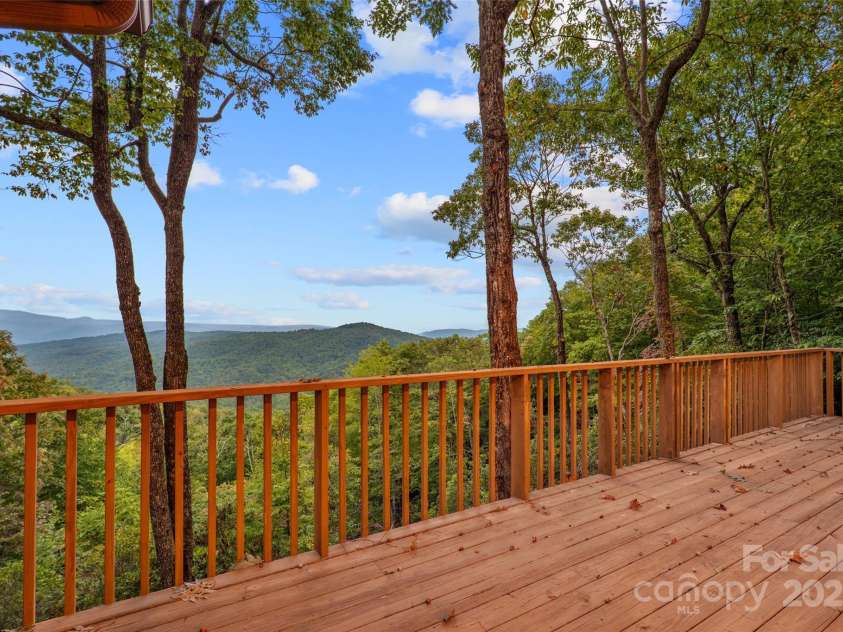 243 Ridgeline Drive, Brevard, NC 28712.  MLS# CAR4313542, YatesRealty ID 4227. Main House Deck