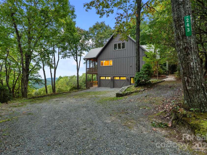 243 Ridgeline Drive, Brevard, NC 28712.  MLS# CAR4313542, YatesRealty ID 4227. Main House Parking Area