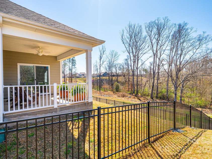 640 Latrobe Drive, Iron Station, NC 28080.  MLS# CAR4238619, YatesRealty ID 4227. Fenced backyard.