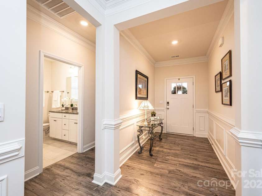 640 Latrobe Drive, Iron Station, NC 28080.  MLS# CAR4238619, YatesRealty ID 4227. Grand long foyer with beautiful molding.