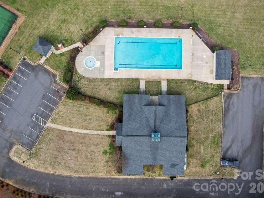 804 Talking Stick Lane, Fort Mill, SC 29708.  MLS# CAR4412697, YatesRealty ID 42293. A spacious pool is a short walk from the unit
