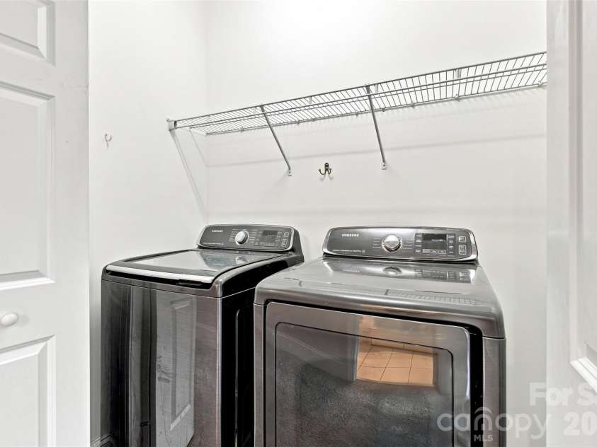804 Talking Stick Lane, Fort Mill, SC 29708.  MLS# CAR4412697, YatesRealty ID 42293. Laundry closet includes these Samsung appliances