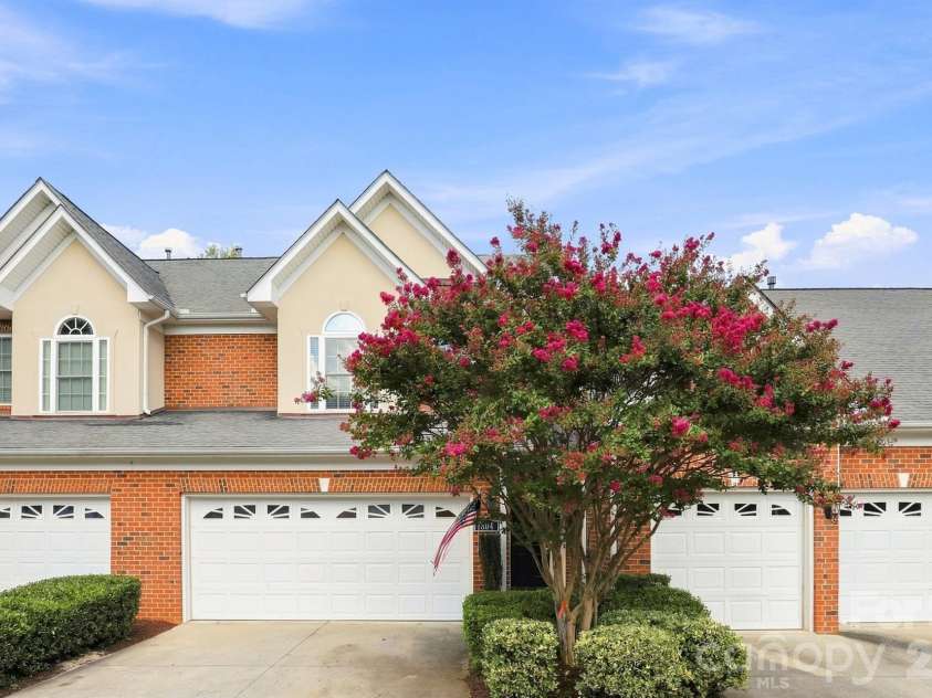 804 Talking Stick Lane, Fort Mill, SC 29708.  MLS# CAR4412697, YatesRealty ID 42293. Upscale brick townhome with spacious double garage