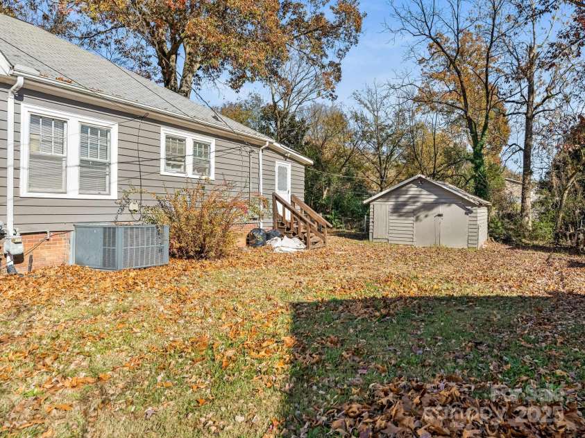 1008 Mable Avenue, Kannapolis, NC 28083.  MLS# CAR4322240, YatesRealty ID 423. Side Yard Shed