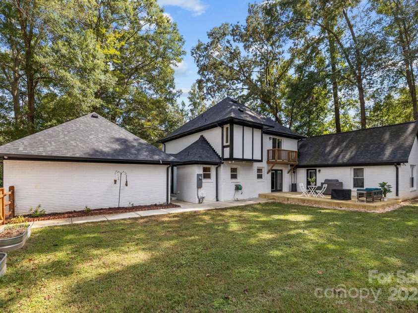 2733 Wellington Street, Rock Hill, SC 29732.  MLS# CAR4185422, YatesRealty ID 4230. Rear yard and house