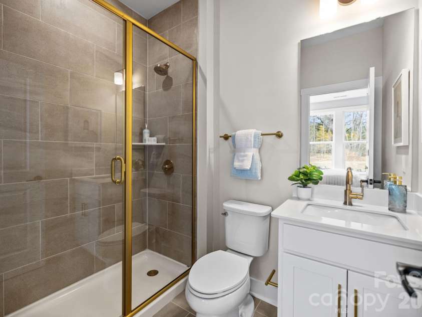 3026 Grandiose Drive, Indian Trail, NC 28079.  MLS# CAR4412254, YatesRealty ID 42300. First Floor Guest Bath - Model Home Photo for Reference Only.