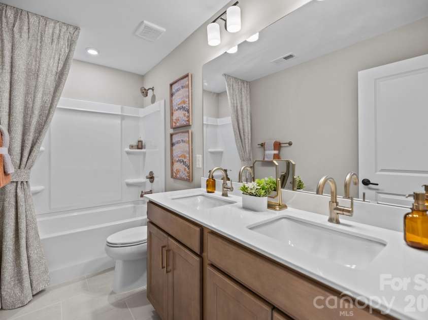 3026 Grandiose Drive, Indian Trail, NC 28079.  MLS# CAR4412254, YatesRealty ID 42300. Second Floor Hall Bath - Model Home Photo for Reference Only.