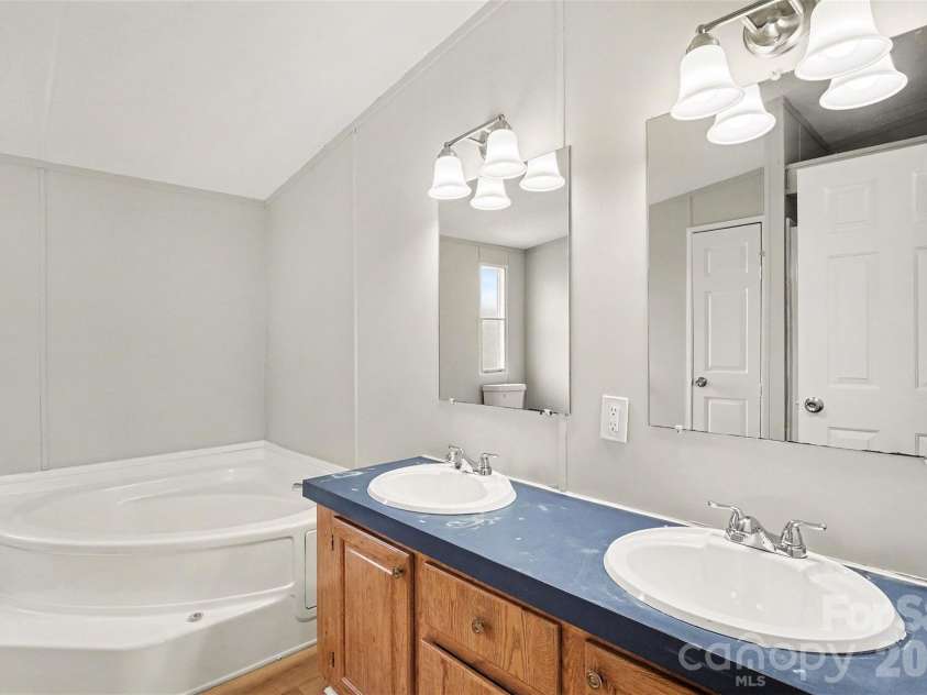 2721 New Salem Road, Monroe, NC 28110.  MLS# CAR4412833, YatesRealty ID 42309. Primary bathroom