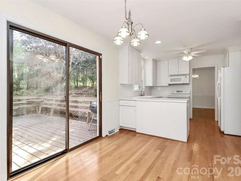 7501 Folger Drive, Charlotte, NC 28226.  MLS# CAR4325075, YatesRealty ID 4232. Breakfast area and back door
