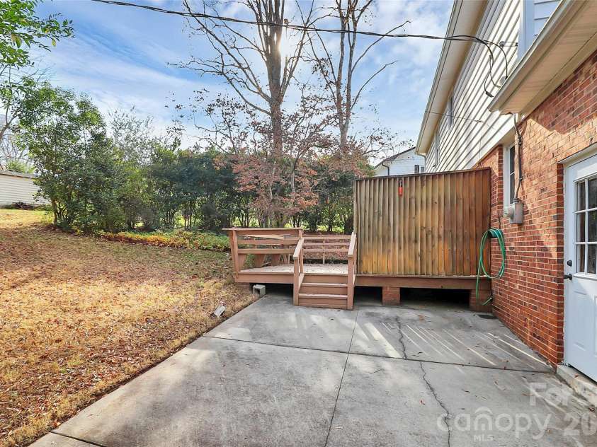 7501 Folger Drive, Charlotte, NC 28226.  MLS# CAR4325075, YatesRealty ID 4232. Private patio, deck and storage room