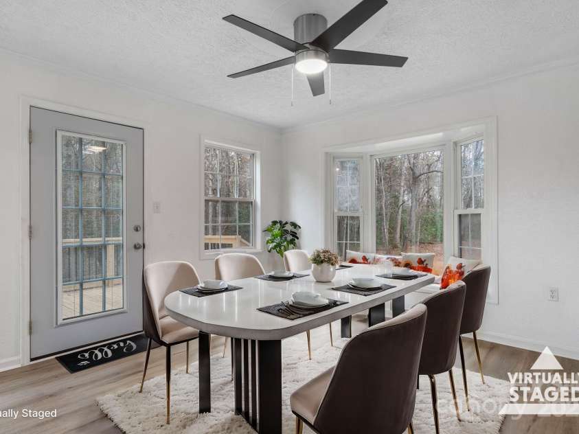 1485 NC Hwy 16 Highway, Taylorsville, NC 28681.  MLS# CAR4200635, YatesRealty ID 4233. Digital staging sunroom