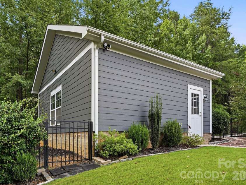 18609 Boulder Rock Loop, Davidson, NC 28036.  MLS# CAR4411962, YatesRealty ID 42335. The detached two-car garage provides valuable parking, storage, and everyday functionality.