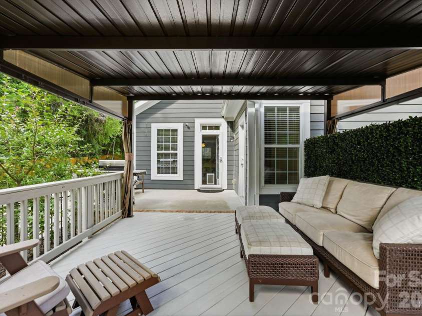18609 Boulder Rock Loop, Davidson, NC 28036.  MLS# CAR4411962, YatesRealty ID 42335. The spacious deck offers plenty of room for multiple seating and dining arrangements.