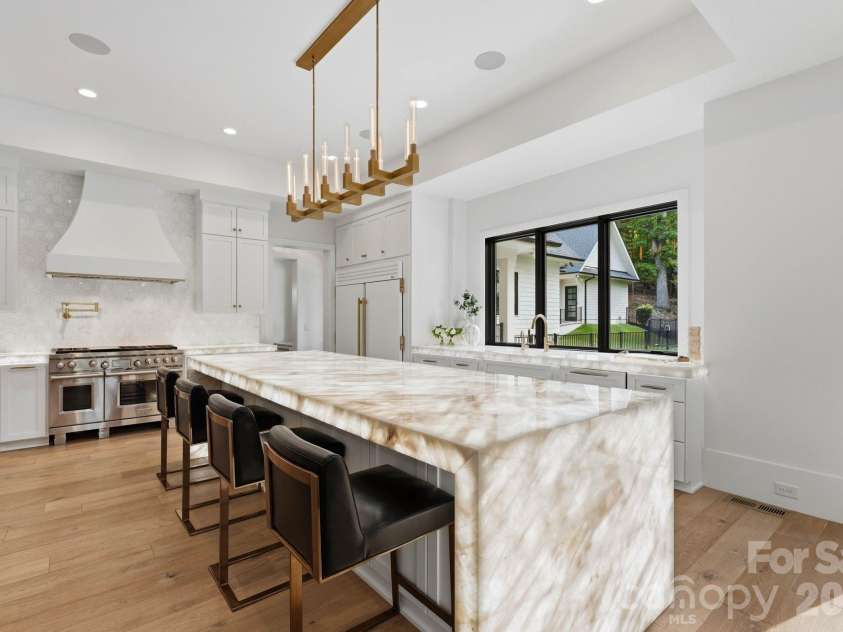 13702 Sage Thrasher Lane, Charlotte, NC 28278.  MLS# CAR4405841, YatesRealty ID 42347. Chef's kitchen with designer appliances