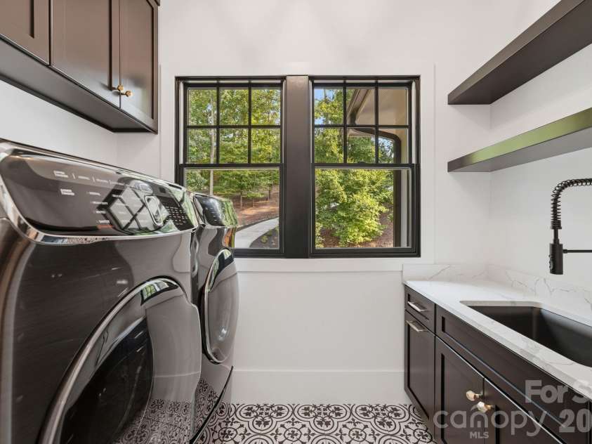 13702 Sage Thrasher Lane, Charlotte, NC 28278.  MLS# CAR4405841, YatesRealty ID 42347. Second laundry room upstairs