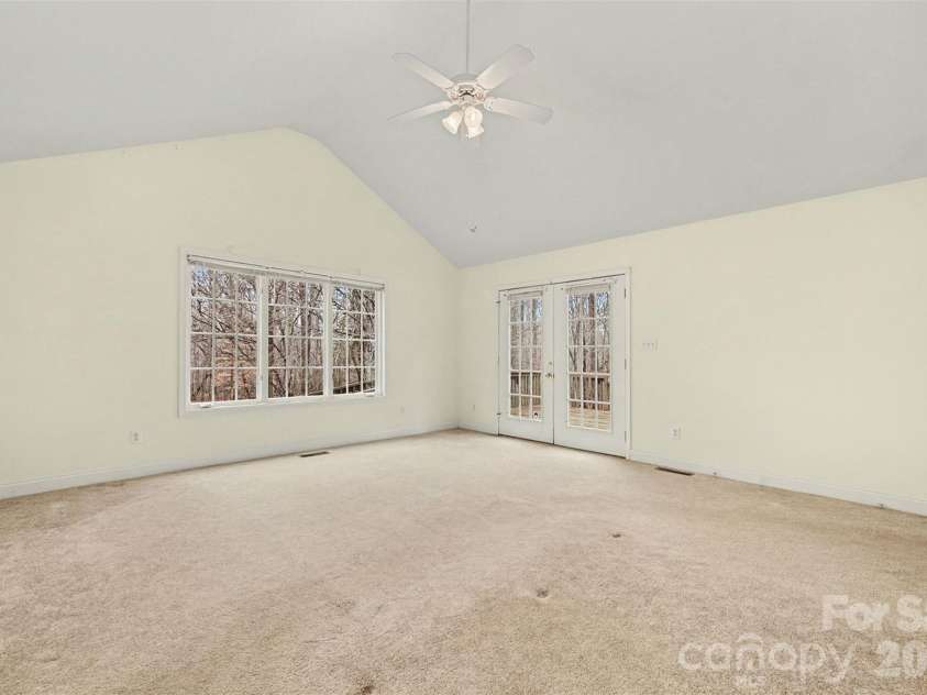 6619 Loblolly Circle, Waxhaw, NC 28173.  MLS# CAR4341573, YatesRealty ID 4235. Primary BR toward Deck Access Doors