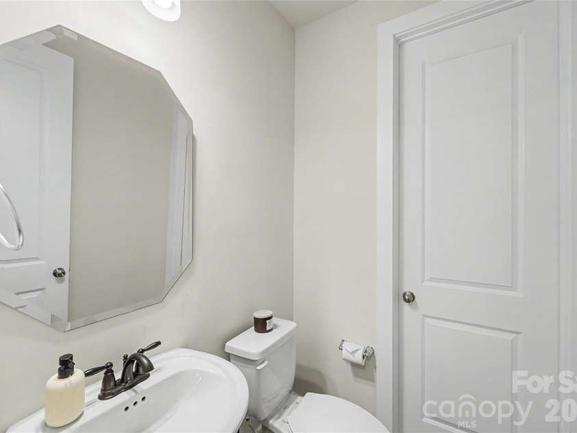 1717 Unison Drive, Charlotte, NC 28262.  MLS# CAR4405855, YatesRealty ID 42350. Lover Level Half Bath