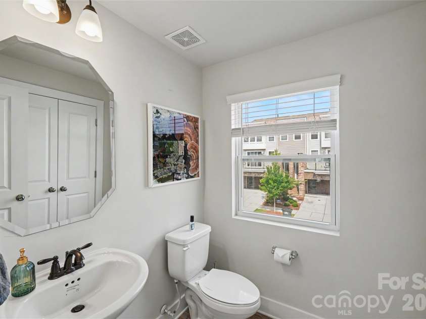 1717 Unison Drive, Charlotte, NC 28262.  MLS# CAR4405855, YatesRealty ID 42350. Main Level Half Bath
