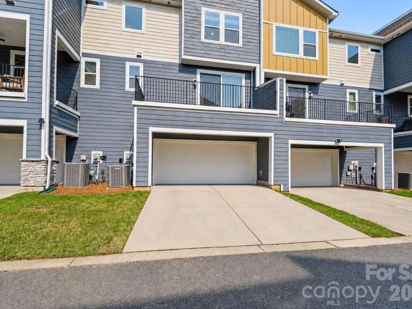 1717 Unison Drive, Charlotte, NC 28262.  MLS# CAR4405855, YatesRealty ID 42350. Two Car Garage