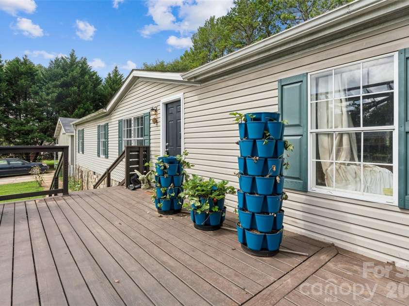 912 Grace Drive, Stanley, NC 28164.  MLS# CAR4406122, YatesRealty ID 42356. Large deck area..