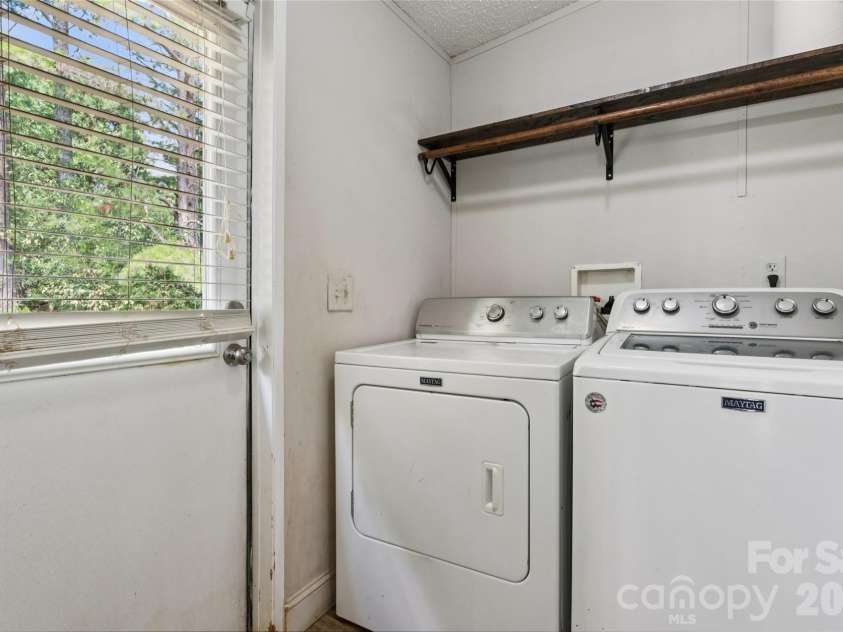 912 Grace Drive, Stanley, NC 28164.  MLS# CAR4406122, YatesRealty ID 42356. Laundry room..