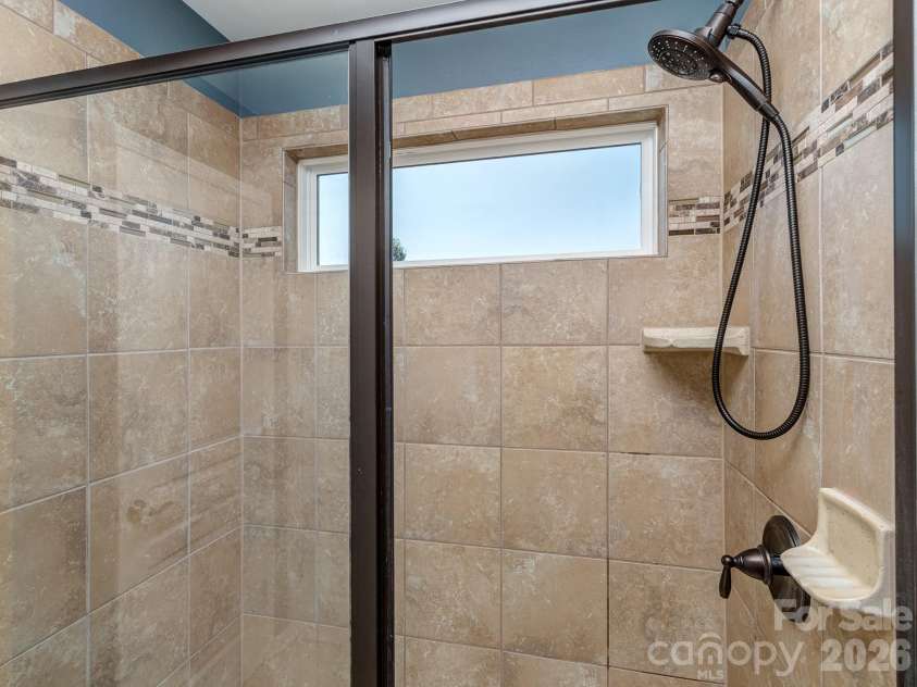 5951 Carrollton Lane, Charlotte, NC 28210.  MLS# CAR4409578, YatesRealty ID 42367. Primary shower