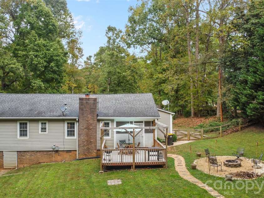 113 Sawtooth Lane, Stanley, NC 28164.  MLS# CAR4410991, YatesRealty ID 42374. Firepit and deck