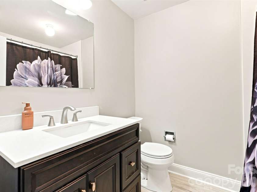 113 Sawtooth Lane, Stanley, NC 28164.  MLS# CAR4410991, YatesRealty ID 42374. Hall Guest bath