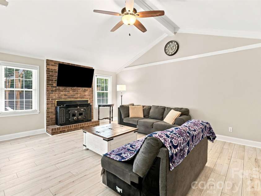 113 Sawtooth Lane, Stanley, NC 28164.  MLS# CAR4410991, YatesRealty ID 42374. Wood burning fireplace