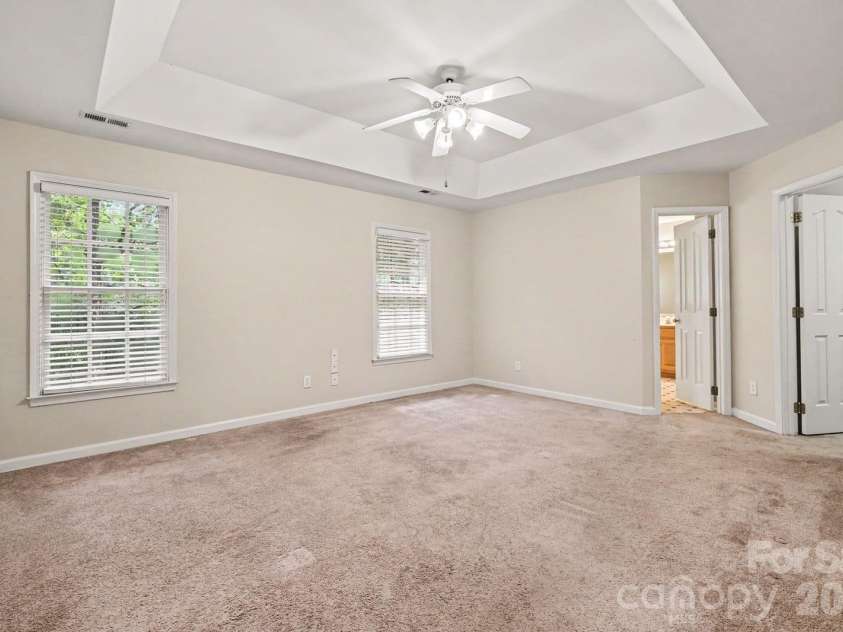 17208 Sycamore Ridge Court, Cornelius, NC 28031.  MLS# CAR4393421, YatesRealty ID 42378. Master bedroom