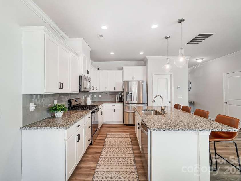 19117 Hawk Haven Lane, Charlotte, NC 28278.  MLS# CAR4215357, YatesRealty ID 4238. Island/kitchen view